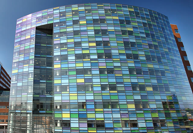 Johns Hopkins Children's Center exterior view of multicolored, glass building.