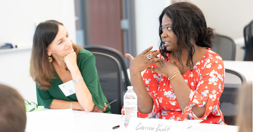 Attendees in conversation