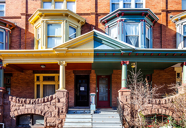 Front porches of rowhomes in Charles Village.