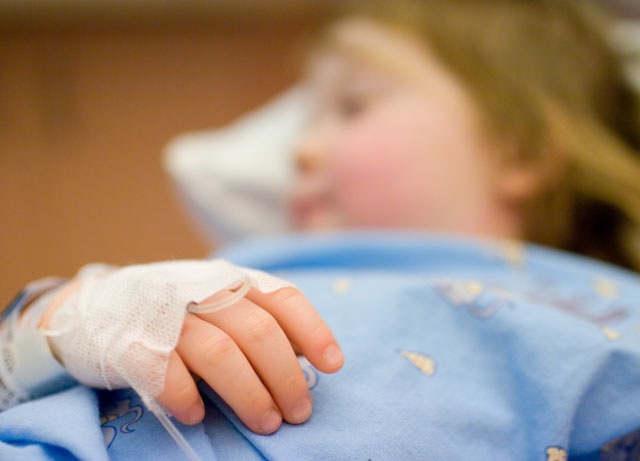 child in hospital bed