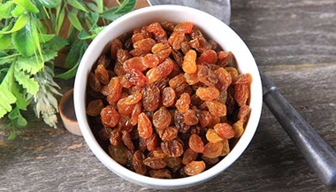 Bowl of golden raisins