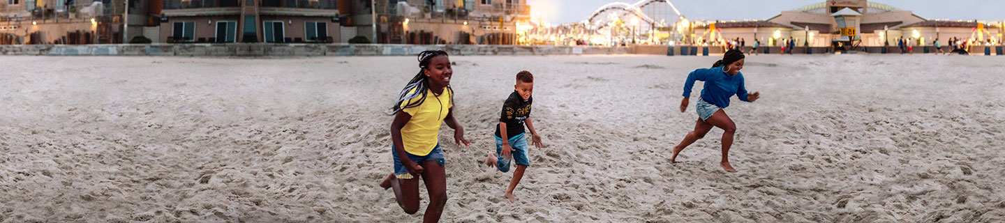 children playing on the beach