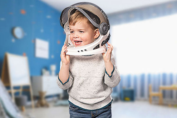 Lem playing with an astronaut helmet