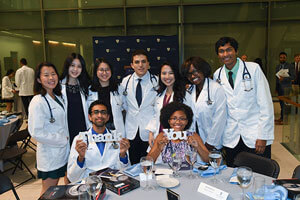 Group of Alumni Sitting Around Table