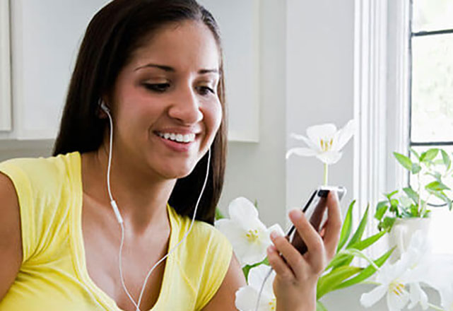 woman listening to podcast