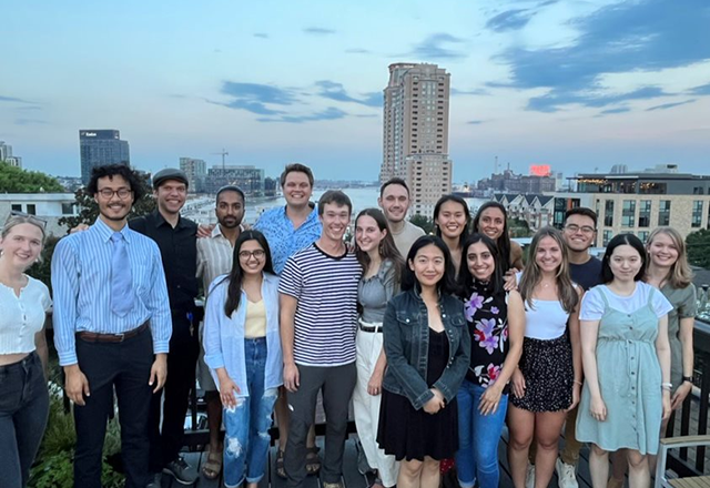 students with the baltimore skyline